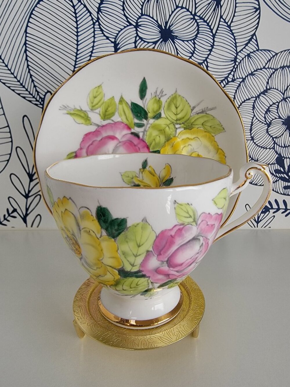 Roslyn bone china teacup and saucer; pink & yellow roses gold trim vintage